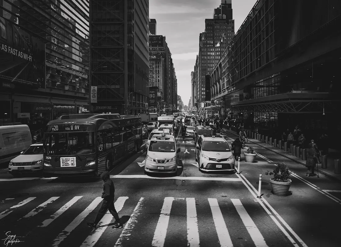A black and white city street, each region coloured by its class